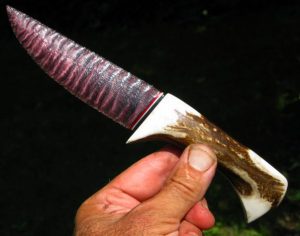 flintknapped purple fiber optic glass knife